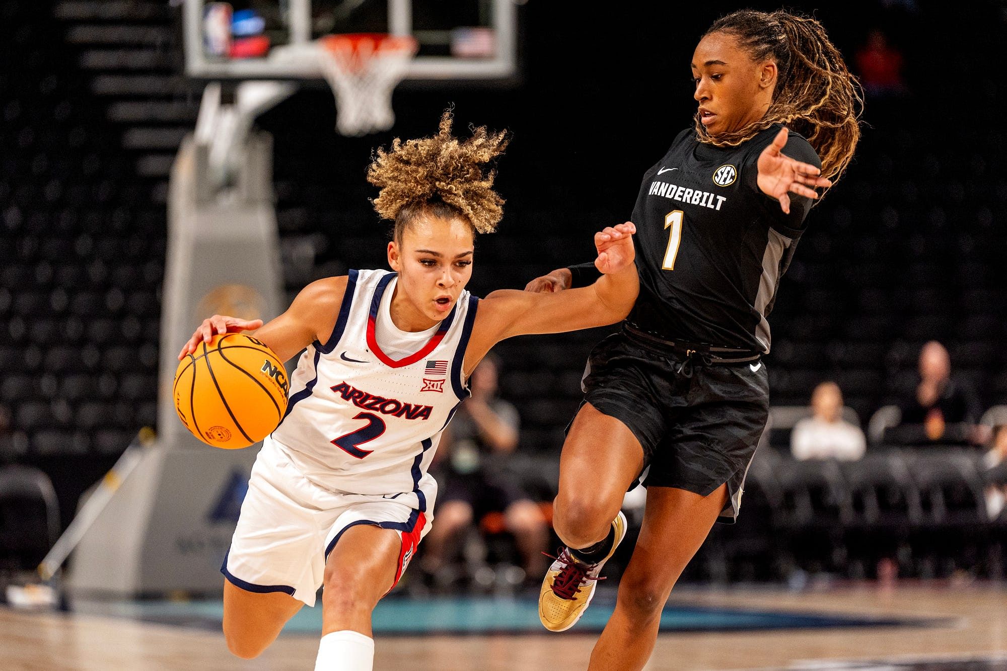 Arizona guard Jada Williams (#2) drives the ball against Vanderbilt guard Mikayla Blakes (#1) in their NCAA basketball game at Acrisure Arena in Palm Desert, California on November 26, 2024. Photo: Imagn